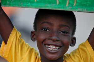 bigstockphoto_African_Boy_Yellow_Shirt_Gree_3926088